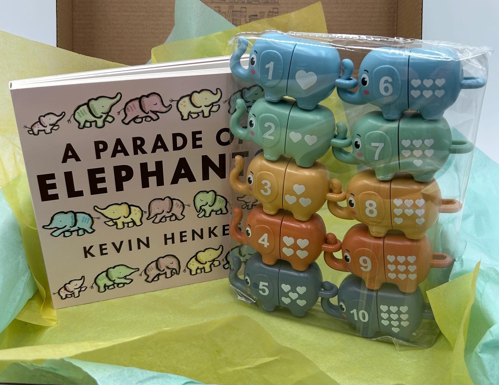 A Parade of Elephants Board Book Box with number matching elephants