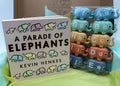 A Parade of Elephants Board Book Box with number matching elephants