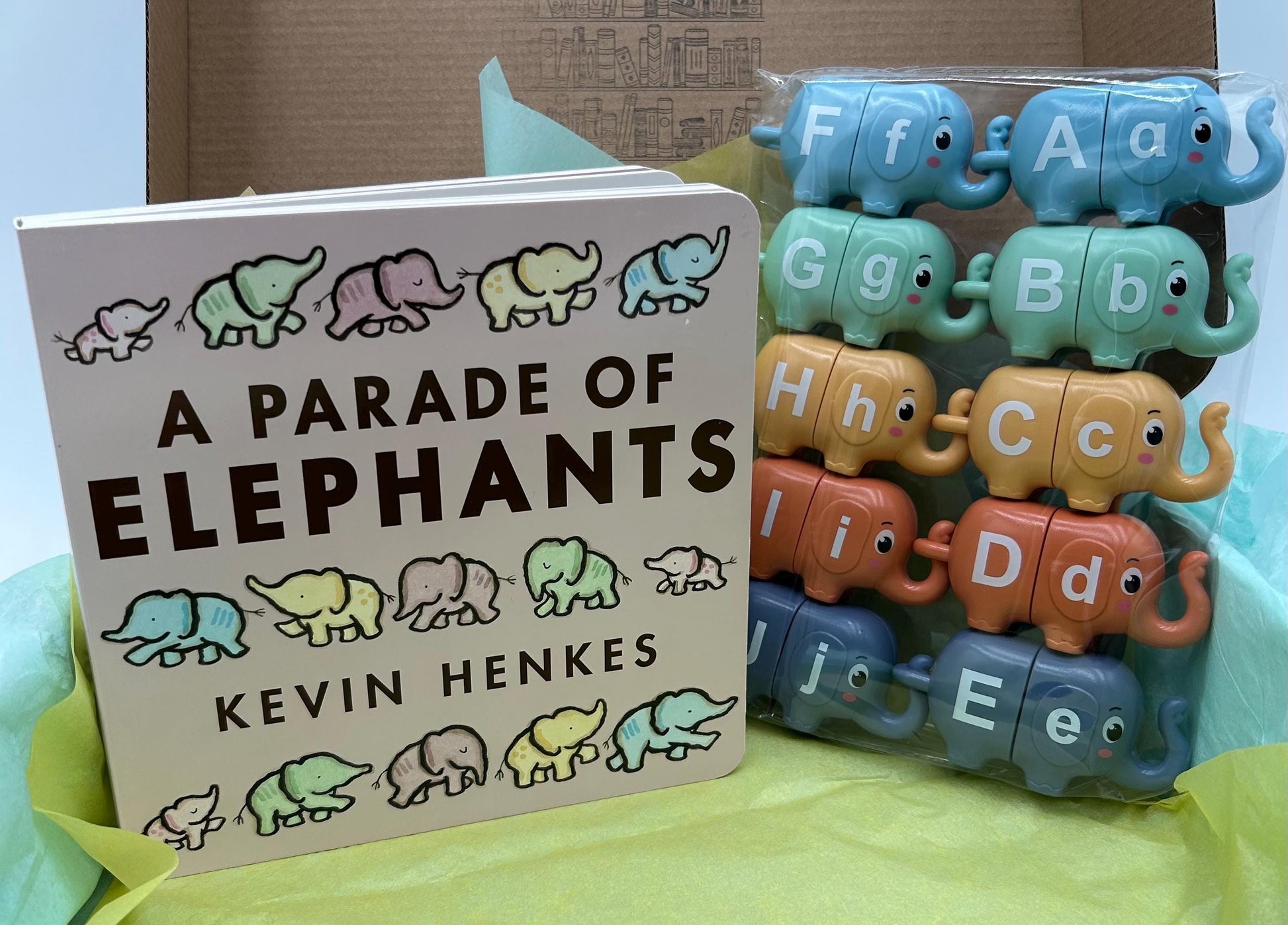 A Parade of Elephants Board Book Box with number matching elephants